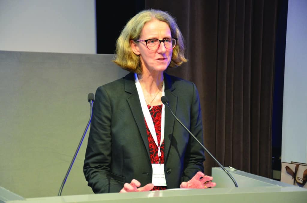 Jennifer Lewis, Executive Director of IBMA, speaking about biocontrol at podium